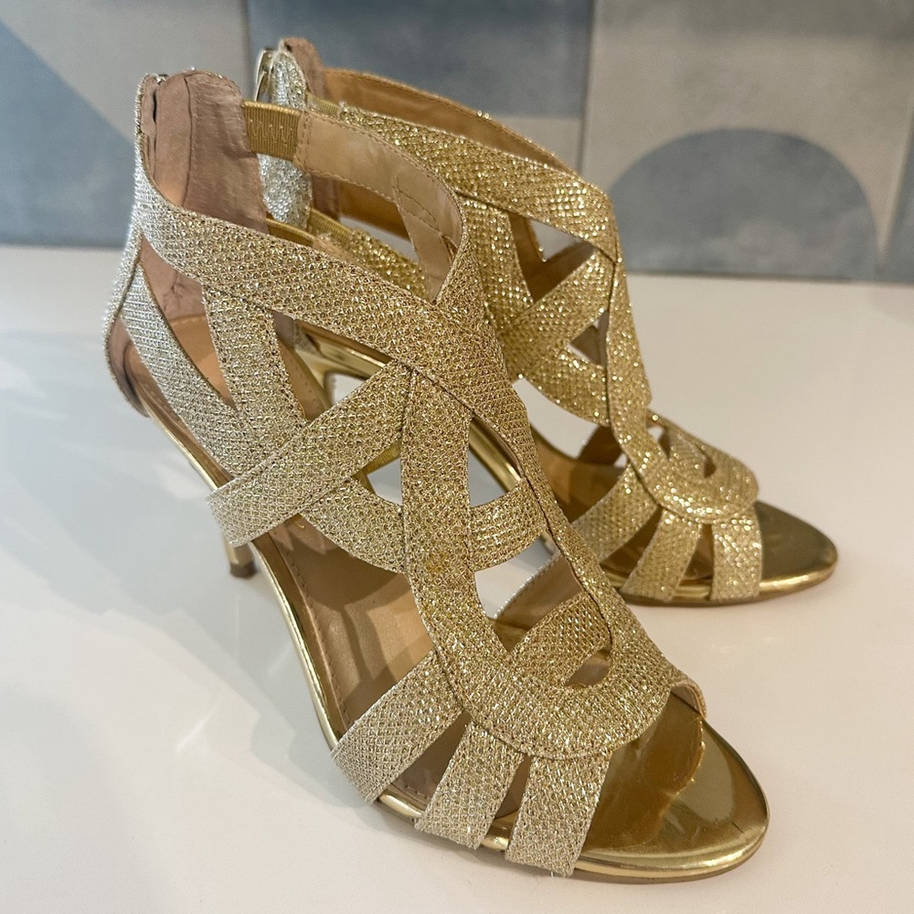 Marc Fisher gold strappy heels.